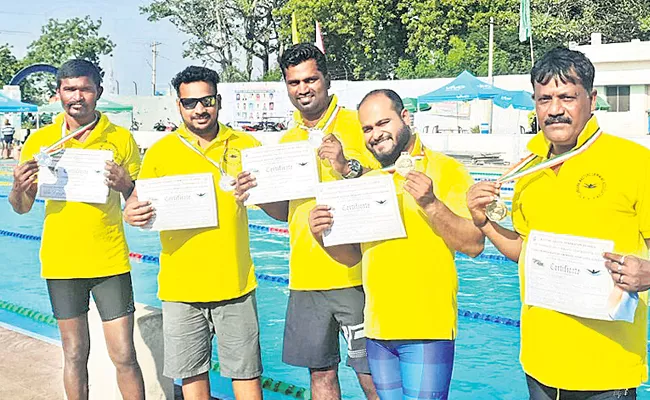 Surendra Gets Four Gold Medals In Masters Swimming - Sakshi