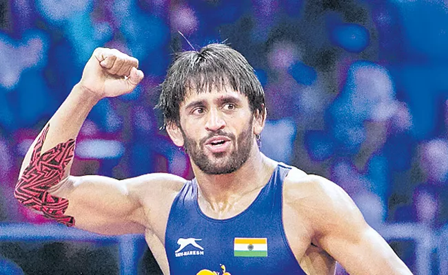 Indian star wrestler Bajrangi Poonia has achieved another rare feat. - Sakshi