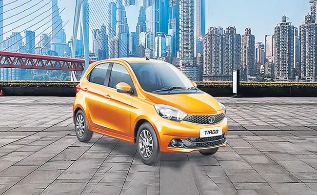 New Tata Tiago XZ Plus launch price Rs 5.57L – Rivals Hyundai Santro - Sakshi