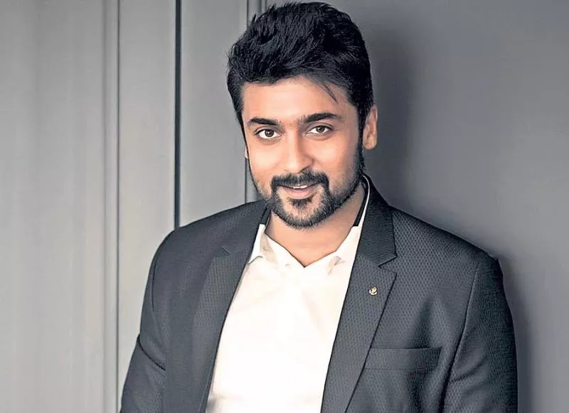 surya gifted gold coins for ngk movie technicians team - Sakshi