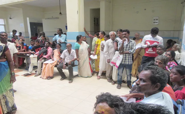 KGH Doctors Negligence on OP day Visakhapatnam - Sakshi