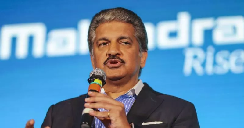 Anand Mahindra says lowering GST on automobiles would help the economy    - Sakshi