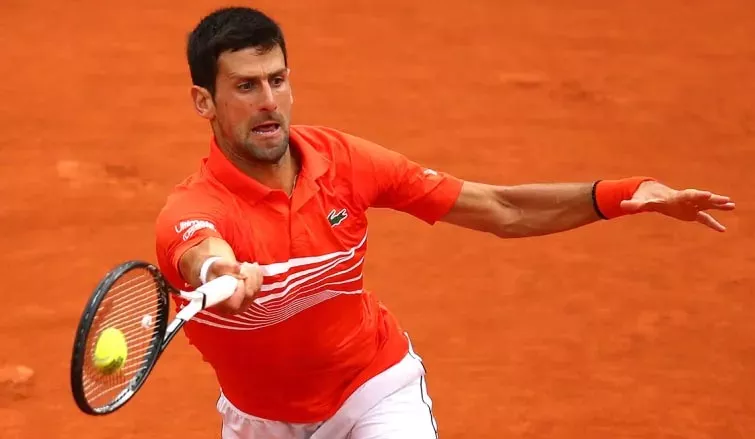 Djokovic first to make quarter-finals 10 straight years in Paris - Sakshi