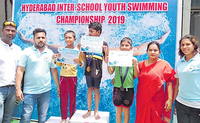 Sachin And Praharshita Got Swimming Titles - Sakshi