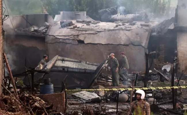 Pakistan Army Plane Crashes Into Residential Area At Rawalpindi - Sakshi