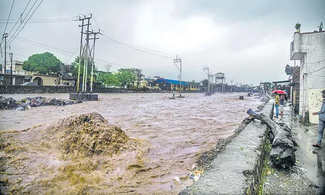 South, west India face devastation after torrential rains, 169 dead in floods - Sakshi