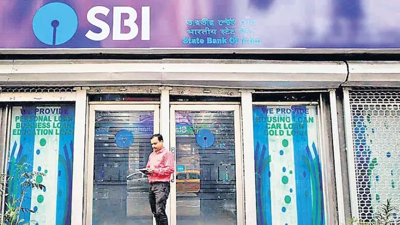 SBI slashes interest rates on car loans, home loans ahead of festive season - Sakshi