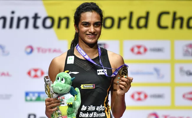 PV Sindhu becomes first Indian to win World Badminton Championships gold - Sakshi