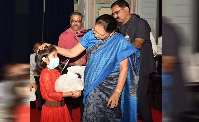Uttar Pradesh Governor Anandiben Patel Adopt A Child Suffering From TB - Sakshi