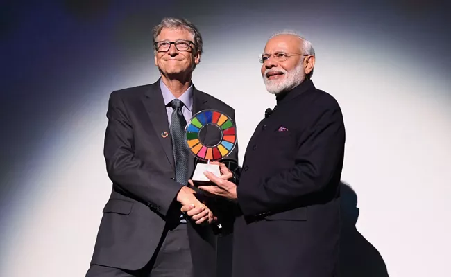Narendra Modi Received Goalkeepers Global Goals Award Swachh Bharat - Sakshi