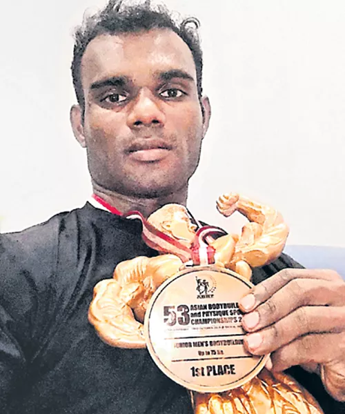 Bodybuilder Ravi Kumar Wins Gold Medal - Sakshi