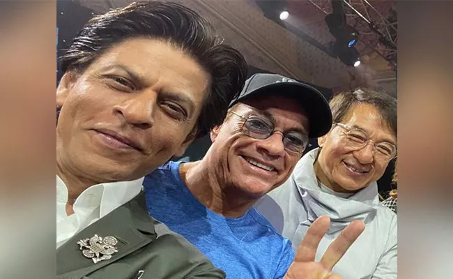 Shah Rukh Khan Poses With Jackie Chan Jean Claude Van Damme In Riyadh - Sakshi