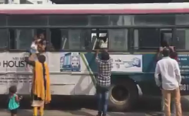 TSRTC Strike Effect  Passengers Struggling To Get Seat In The Bus - Sakshi