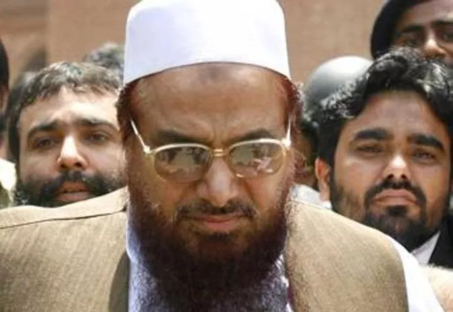 Pakistan court indicts Hafiz Saeed on terror financing charges - Sakshi