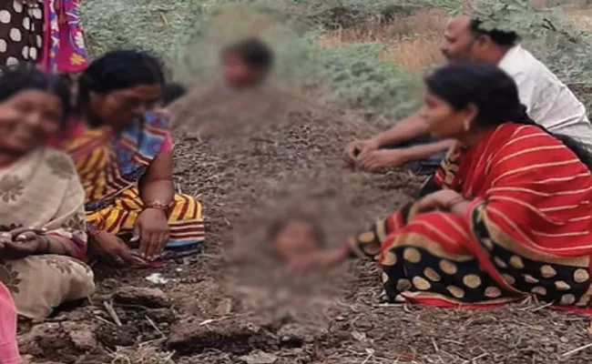 Children Buried Neck Deep Due To Solar Eclipse superstitions In Karnataka - Sakshi