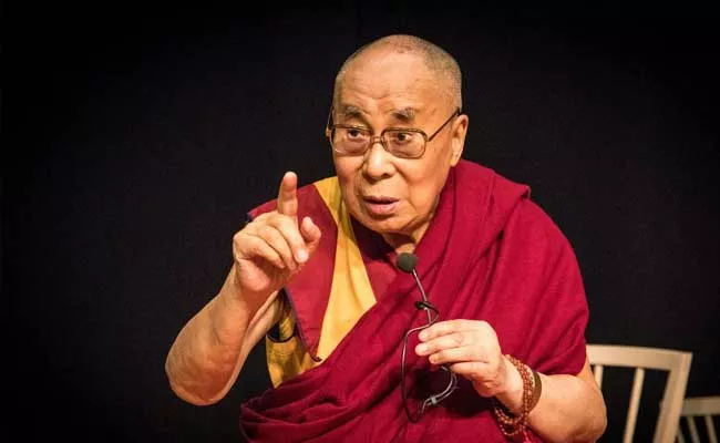 Dalai Lama Asks Devotees To Chant Mantra To Contain Spread Of Coronavirus - Sakshi