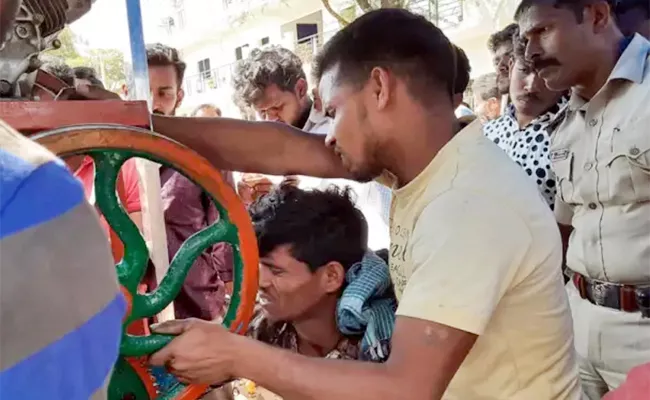 Worker Hand Stuck in Sugarcane Machine in Karnataka - Sakshi