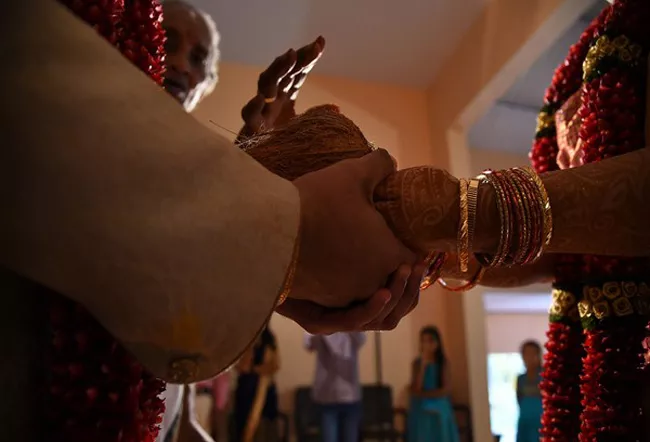 Muslim Couple Conducts Wedding of Adopted Hindu Girl in Hindu Temple - Sakshi