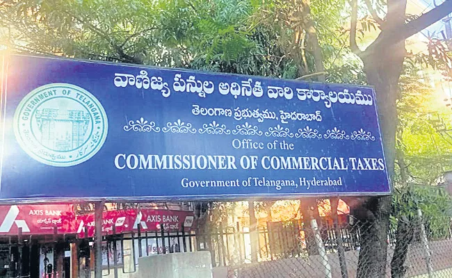 Commercial Tax Department Officials Worried on Holiday - Sakshi