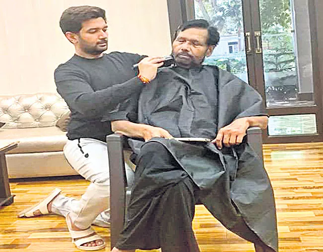 Chirag Paswan trims father Ram Vilas Paswans beard - Sakshi