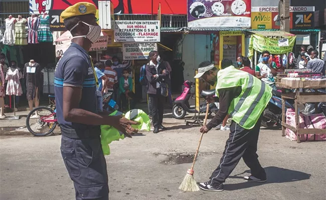 Wear Masks Or Sweep Roads: Madagascar Police - Sakshi