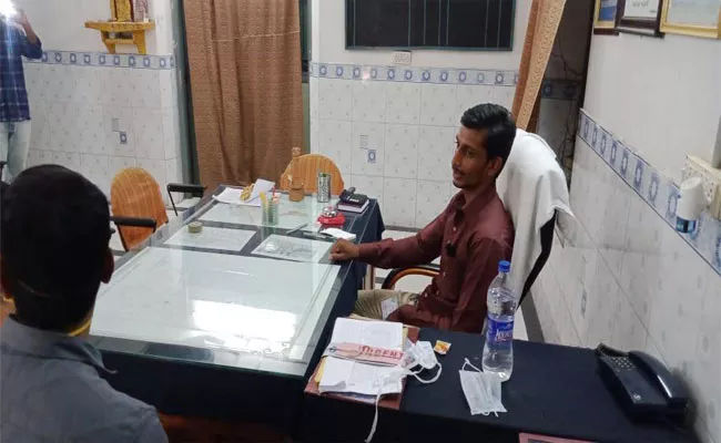 Man Hulchul In Rajahmundry Tahsildar Office - Sakshi
