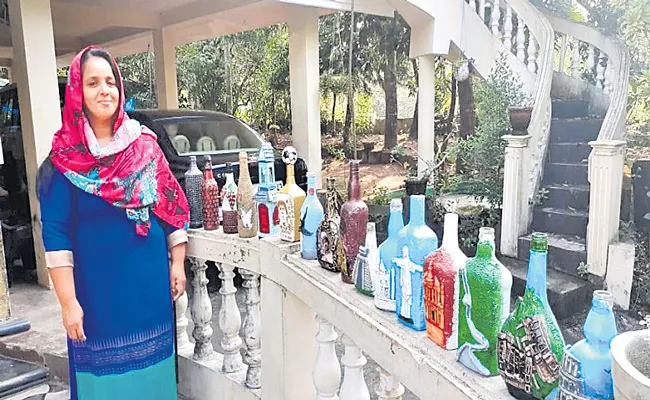 Jisna Nagirsha enters records book with bottle art of seven wonders - Sakshi