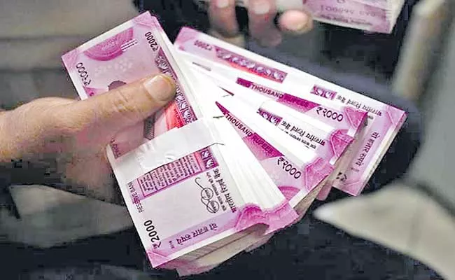Income tax and corporate tax collections at Rs 9.45 lakh crore  - Sakshi