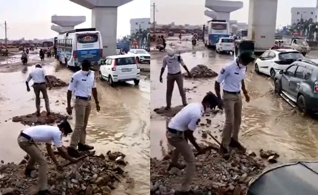 Uppal Traffic Police Clearing Waterlogging At Aditya Hospital Hyderabad - Sakshi