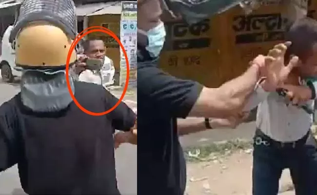 UP IAS Officer Thrashes Journalist In Public During Local Polls Viral - Sakshi