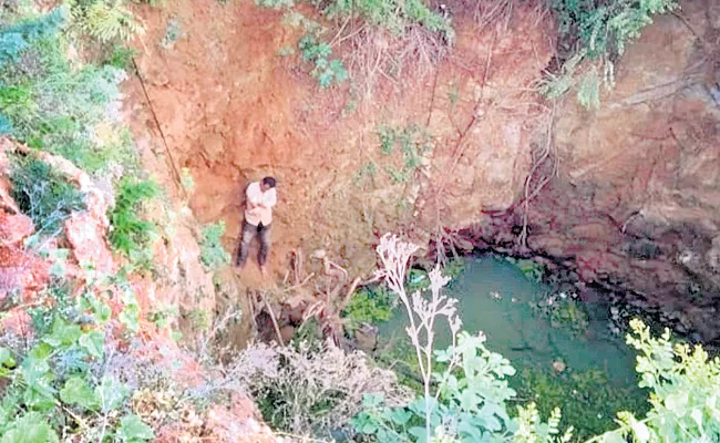 A Man Fell Into A 60 Feet Deep Well While Talking To Phone  - Sakshi