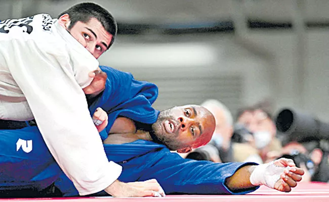 France star judoka Teddy Riner settles for bronze in Tokyo - Sakshi