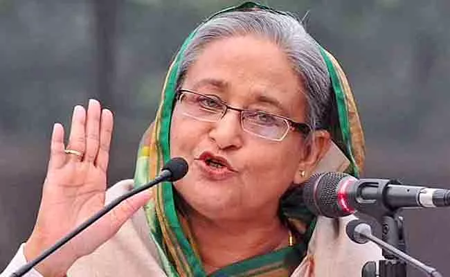 Sheikh Hasina Asks Home Minister Take Actions On Hindu Temples Attacked - Sakshi