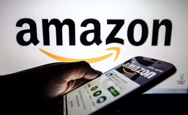 Amazon to ban Visa credit cards in UK - Sakshi