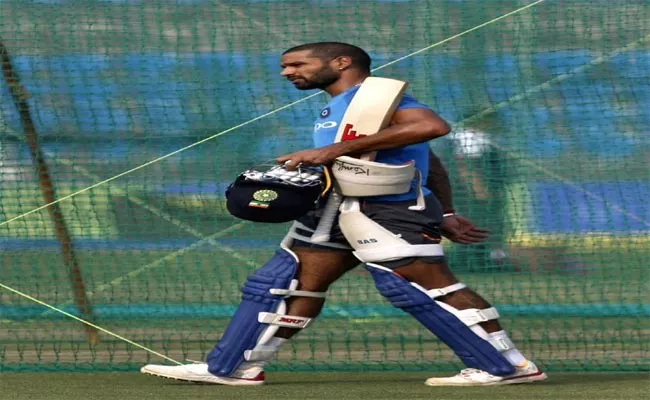 Shikhar Dhawan sweats it out in training session - Sakshi