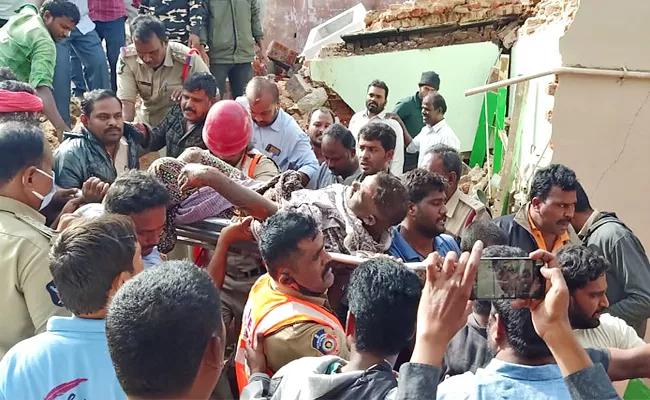 Anantapur Dial 100 Rescued Man Trapped Under the Building Debris - Sakshi