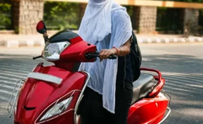 Delhi Girl Said She Can Not Ride Her New Scooty Due to Its Strange Registration Number - Sakshi