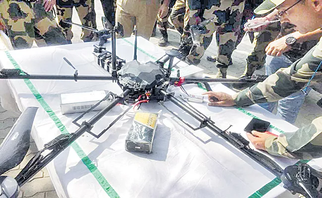 Explosives, Gun, Smuggled By Pak Drone, Recovered In Punjab - Sakshi