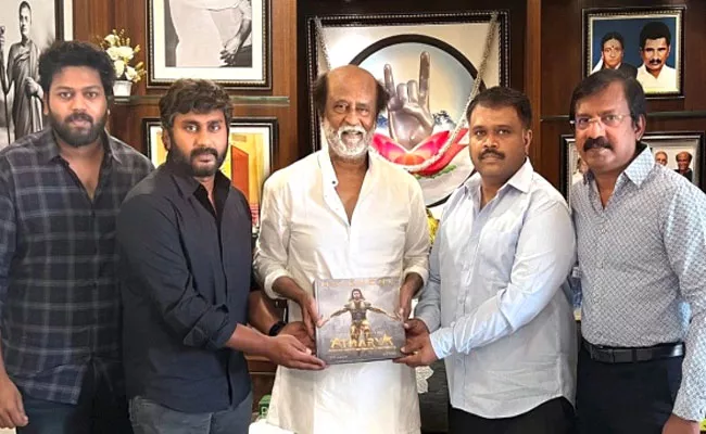 MS Dhoni Atharva First Copy Released By Rajinikanth - Sakshi