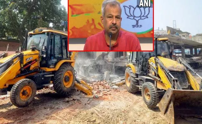 AAP Bulldozer Warning To BJP Delhi Chief - Sakshi