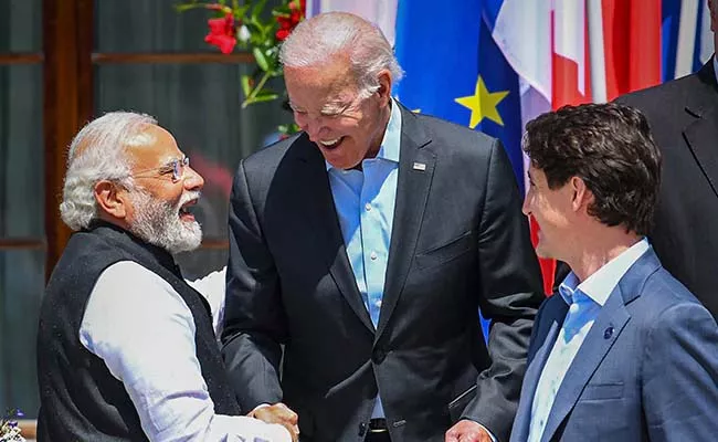 Viral Video Showed Joe Biden Walking Up To PM Modi At G7 - Sakshi