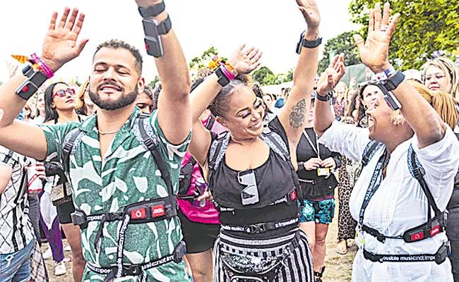 Deaf Festival Fans Rock With Vodafone 5G Haptic Suits - Sakshi