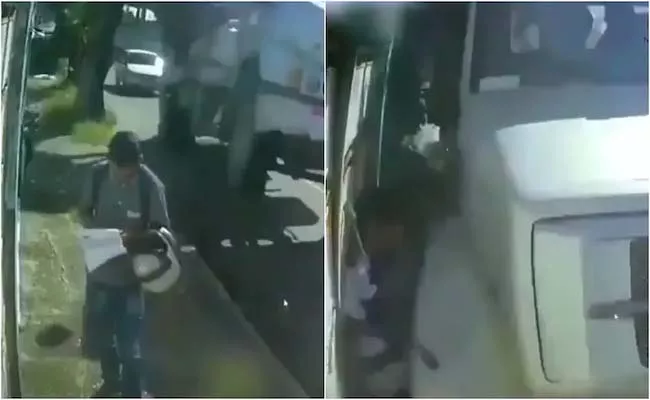 Viral Video: Man Narrowly Escapes Death After Truck Rams In Footpath - Sakshi