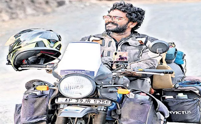 Nellore Young Man From Traveling The Countries On Bike - Sakshi