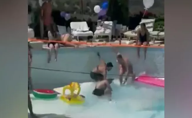 Shocking Video Sinkhole Forms Bottom of Pool Pulls Man Into It - Sakshi