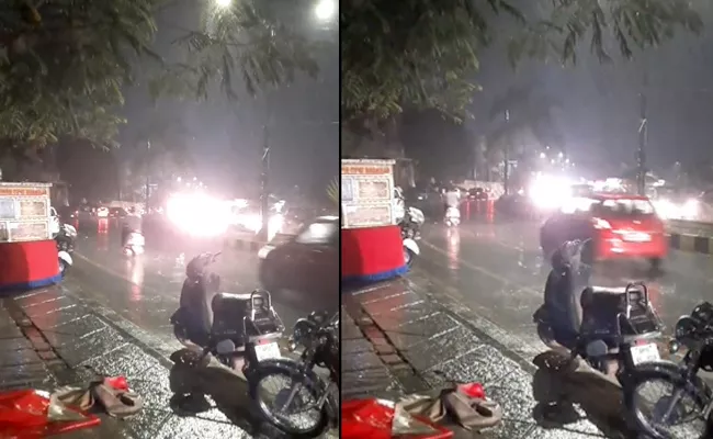 Viral: Heavy Rains Lash Parts of Hyderabad - Sakshi
