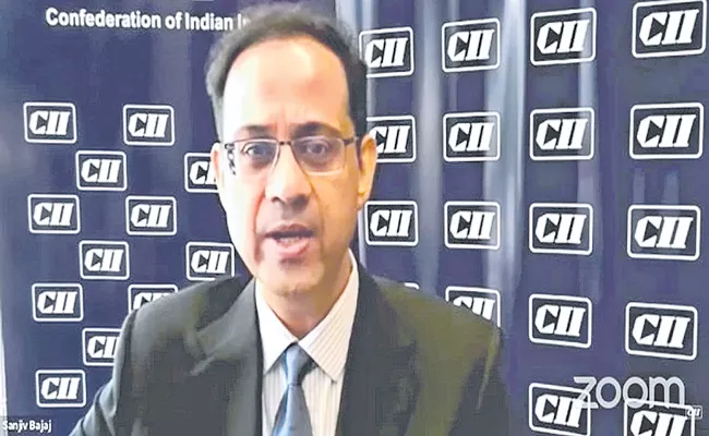 CII chief Sanjiv Bajaj pitches for simplification of GST, reduction in tax slabs - Sakshi