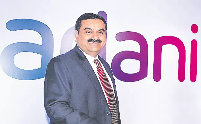 Adani planning to enter telecom spectrum race - Sakshi