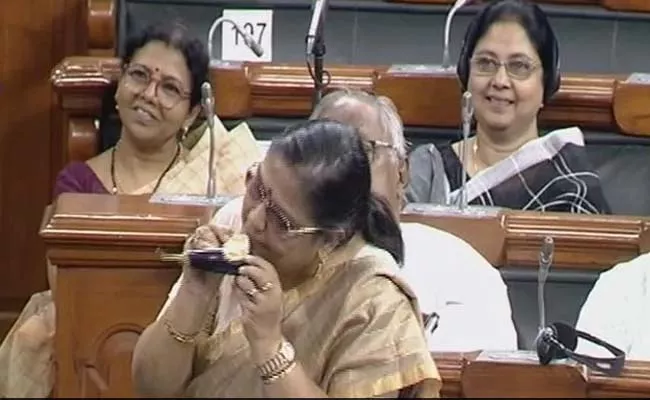 Trinamool MP Bite Brinjal In Parliament During Discussion On Price Rice - Sakshi