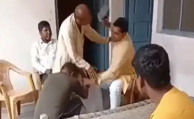 Dalit Youth Beaten With Slippers By Village Head In Uttar Pradesh - Sakshi